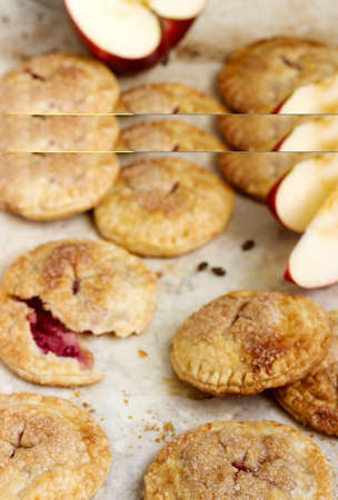 Crispy mini pies with apple and red currant. Rustic style, selective focus.の写真素材