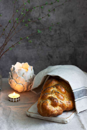 Traditional festive jewish challah bread made from yeast dough with eggs. Selective focus.