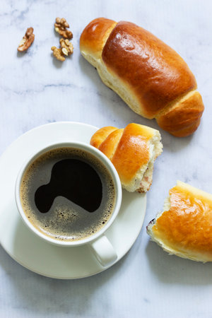 Yeast dough rolls stuffed with jam and nuts.
