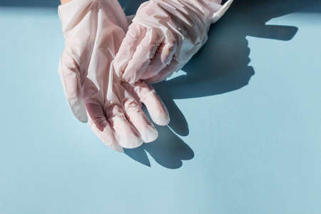Hand and nail care. Gloves with a nourishing and moisturizing hand mask. Selective focus.