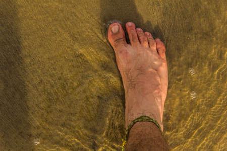 Foot in the sand, Punta del Diablo - Uruguay