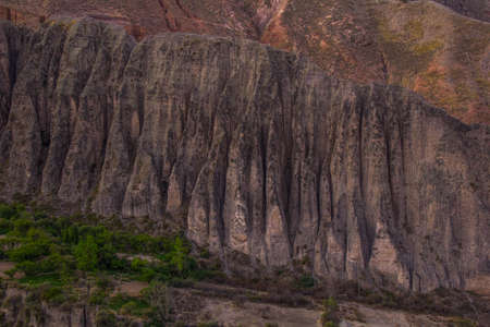 View of Iruya village and multicolored mountains in the surroundings at sunset, Salta province, Argentina, iruya - San Isidro - San Juan treekingの写真素材