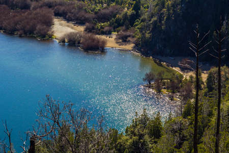 Panoramic view of the beautiful park and lake in Lago Puelo - Argentina in the autumnの写真素材