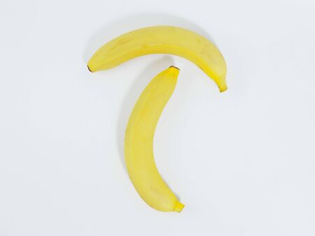 Two bananas isolated on white background.の写真素材