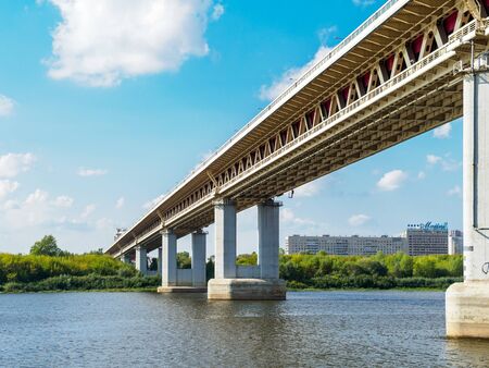 Summer view of metrobridge in Nizhny Novgorod. Big river and blue sky on the background.の写真素材