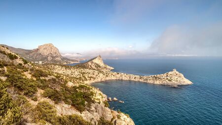 Panoramic view of Tsar beach and Sokol mountain. Sunset landscape of Crimean seashore near Sudak.の写真素材