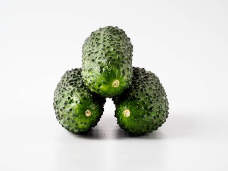 Fresh green cucumber on white background. Copyspace for text.の写真素材