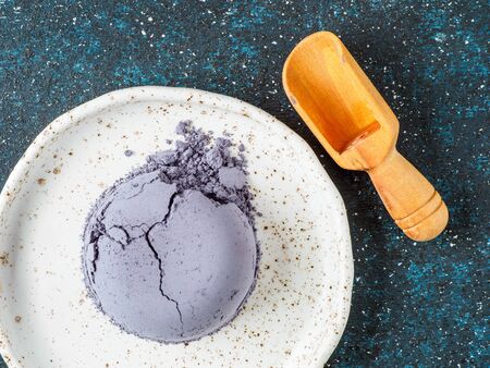 Blue butterfly powder in the white plate.の写真素材
