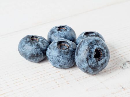 Fresh blueberries on wooden background. Copyspace for text.の写真素材