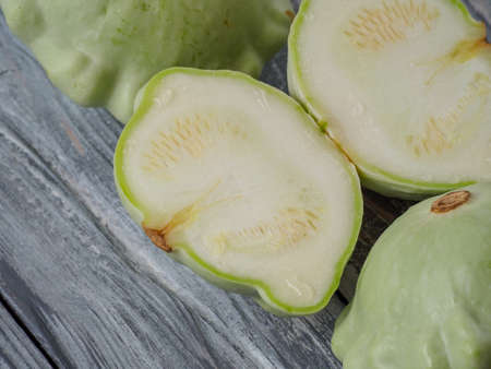 Pattypan squash on old rustic wooden background.の写真素材