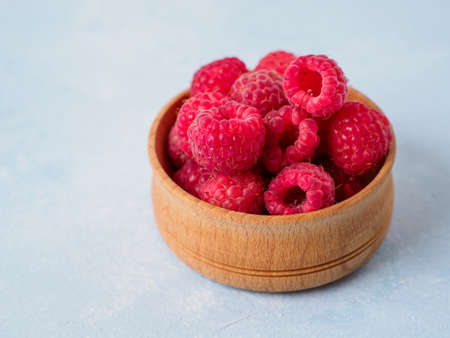 Fresh raspberry in the plate.