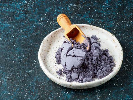Blue butterfly powder in the white plate.の写真素材