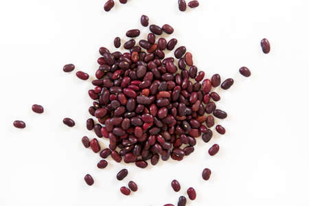 Red beans scattered on the white backgroundの写真素材