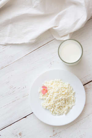 Morning - cottage cheese with milk for breakfastの写真素材
