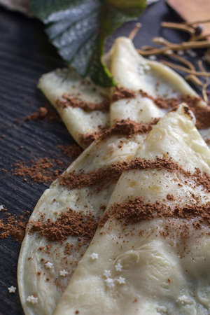 Tasty homemade pancakes on a dark backgroundの写真素材