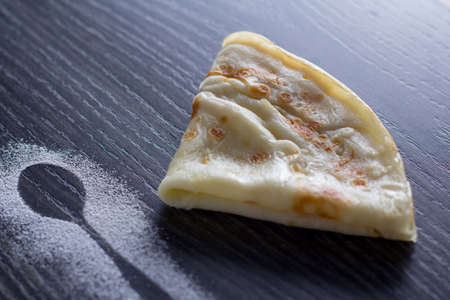 Tasty homemade pancakes on a dark backgroundの写真素材