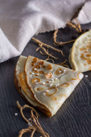 Tasty homemade pancakes on a dark backgroundの写真素材