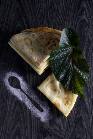 Tasty homemade pancakes on a dark backgroundの写真素材