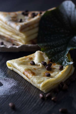 Tasty homemade pancakes on a dark backgroundの写真素材