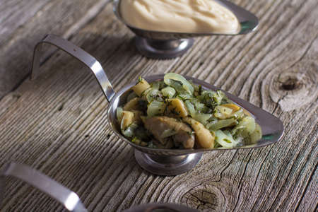 Homemade mushroom sauce on a wooden backgroundの写真素材