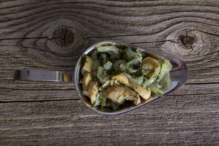 Homemade mushroom sauce on a wooden backgroundの写真素材