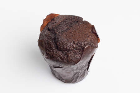 Fresh chocolate muffin on white background, isolatedの写真素材