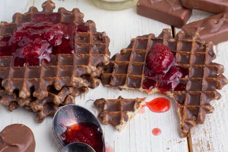Still life - chocolate wafers on a wooden white backgroundの写真素材