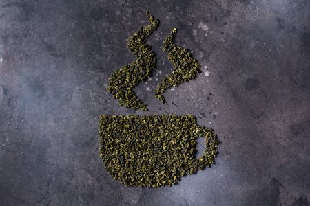 Badges from tea leaves, lettering on black backgroundの写真素材