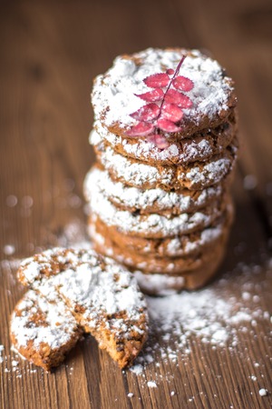 Stack of sugar cookies on a wooden backgroundの写真素材