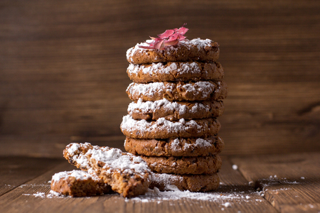 Stack of sugar cookies on a wooden backgroundの写真素材