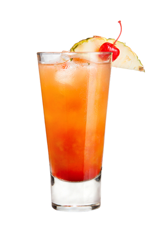 Refreshing cocktail with pineapple and maraschino cherry decoration on a white backgroundの写真素材