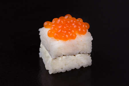 oshi - traditional japanese food, sushi on a black backgroundの写真素材