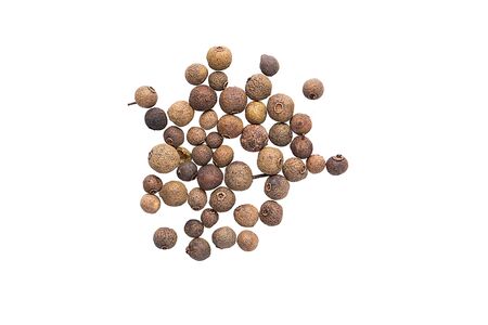 A scattering of allspice on a white background, isolatedの写真素材