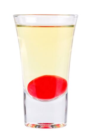 Shot. Alcoholic drink on a white background, isolatedの写真素材