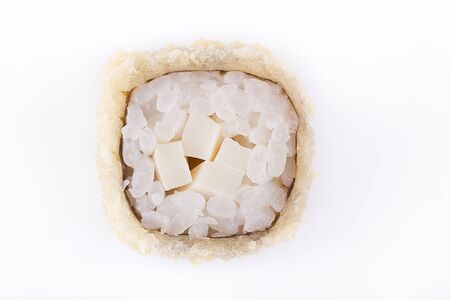 Fried sushi roll with squid. Japanese food. Hot roll with a crisp crusty on a white background. Isolatedの写真素材