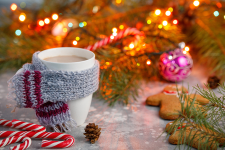 Winter hot drink christmas background.Holiday cocoa cup home gingerbread cookie on a table. Xmas beverages concept.New year cocoa advertisement design. New Years still life.の写真素材