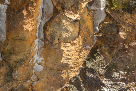 Texture of a mountain wall. Relief of the mountain. Rock texture.