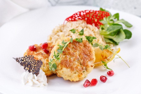 Cutlet in Kiev with garnish of brown rice.の写真素材