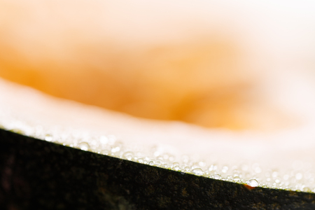 Yellow sweet slice of pumpkin fresh harvest. Clos-up.の写真素材