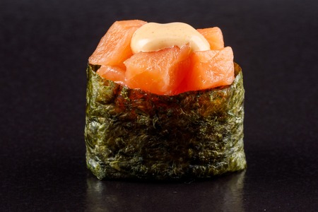 Classic sushi roll. Sushi at black background.Japanese seafood sushi , sushi a black background. Macro.の写真素材