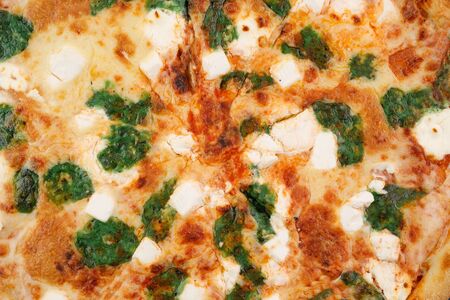 Four cheese pizza texture. Macro. Background of pizza toppings.の写真素材