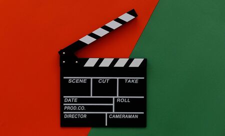 Filmmaking concept. Movie Clapperboard. Cinema begins with movie clappers. Top view. Copy space. Place for your text.の写真素材