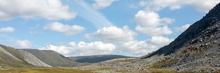 Mountain landscape, lake and mountain range, large panorama, Subpolar Urals. The concept of outdoor activities and tourism.の写真素材