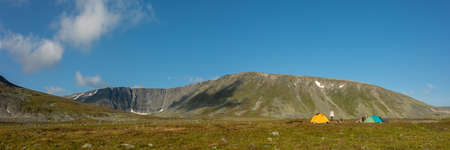 Mountain landscape, lake and mountain range, large panorama, Subpolar Urals. The concept of outdoor...