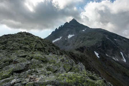 Amazing mountain landscape with colorful sky. Travel and hiking concept. Subpolar Urals.