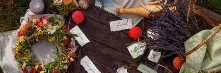 Still life on a wooden table. Lavender seeds, buds and flowers - aromatherapy and herbal medicine....