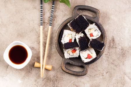 Japanese sushi food. Top view of sushi. Rolls with masaga caviar. Still life. Unusual composition of rolls.の写真素材