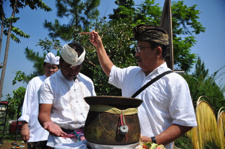 Bogor, Indonesia - September 11, 2011: Hindus people conducting a hindus religious ceremony at...