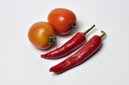 Red Chili and Tomatoの写真素材