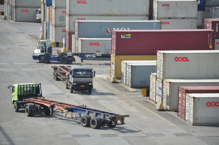 Jakarta, Indonesia - May 6, 2017: Container unloading truck in logistics yard at the port of Tanjung...